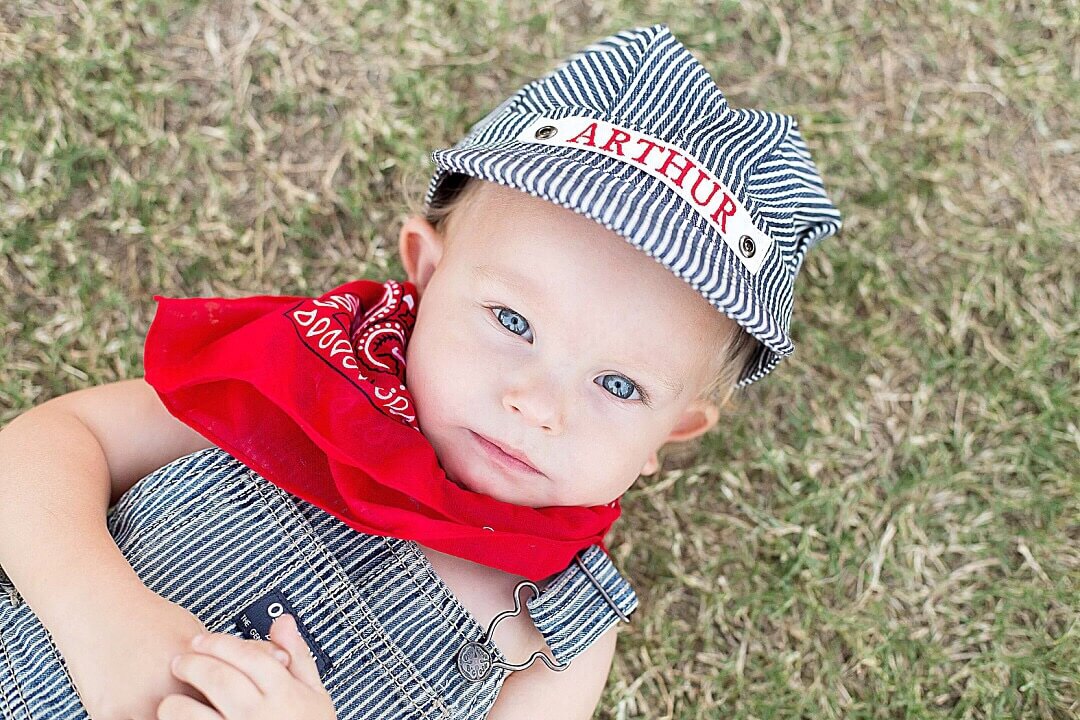 Adorable Boy in Train Hat